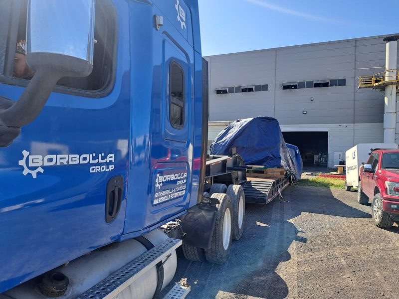 The first packages delivered to site on our own tractor and lowboy.