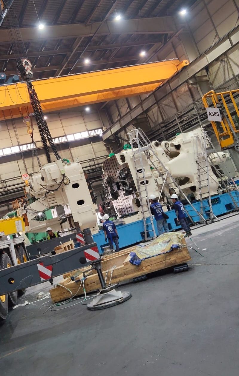 The three main sections set on the bed and the crane stood down.