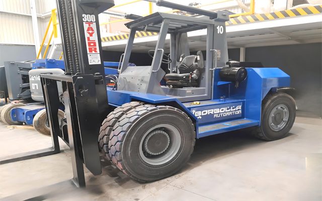 Heavy forklift on site for the move.