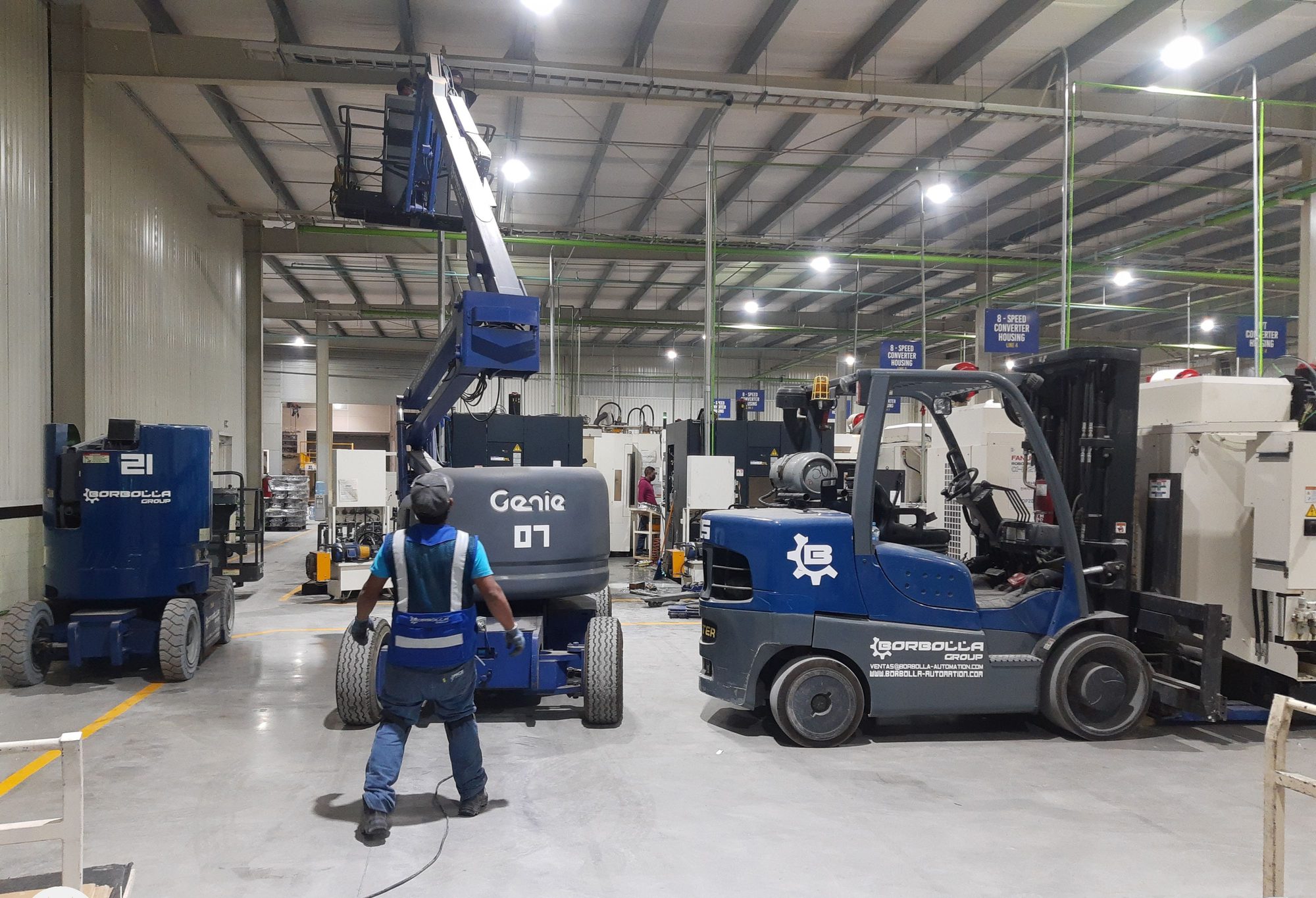 FANUC Robodrill and MAKINO machines being positioned on the converter housing line.